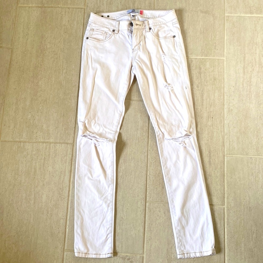 CAbi size 2 slim boyfriend distressed jeans in cream. Barely worn